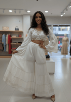 White Cotton Sharara Palazzo with Intricate Gold Zari Border - GREYS∞UL